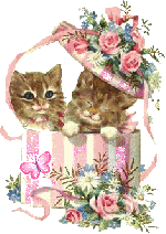 Котята в коробке с цветами