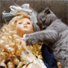 Кот лапает куклу