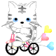 Котенок едет на велосипеде