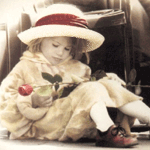 Девочка грустит над цветочком