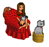 Девушка на красном кресле, котенок - на пуфике