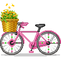 Розовый велосипед с корзиной цветов