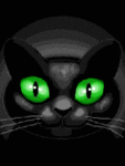 Черная кошка с зелеными глазами