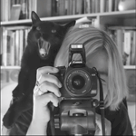 С котом и фотоаппаратом