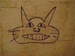 Кошак-рисунок на стене