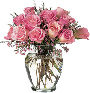 Букет нежных розовых роз в прозрачной вазе прекрасен