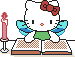 Котенок читает книгу