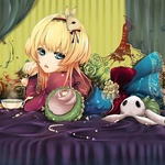  <b>Девочка</b> с кружкой чая и игрушечным кроликом лежит на кров... 