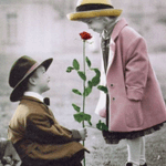 Мальчик дарит девочке розу