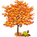 Смайлик под деревом с желтыми листьями