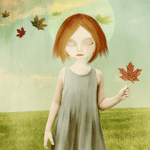 Девочка с осенним листиком в руке