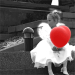 Девочка с шариком в виде сердца