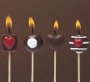 Шоколадные свечки в виде сердечек на палочках