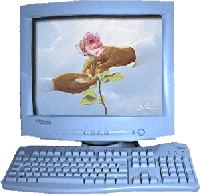Компьютер с розой в руках