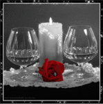 Свеча, бокалы, роза