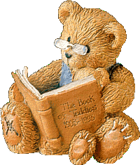  <b>Медведь</b> читает книгу в очках 